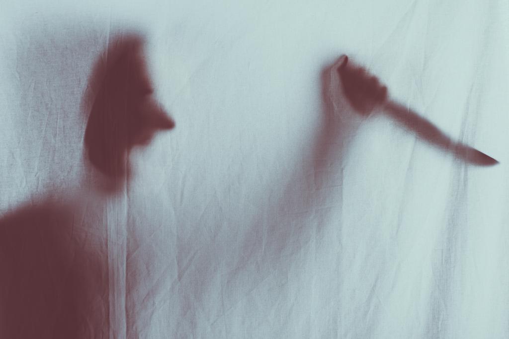 scary blurry silhouette of person screaming and holding knife behind veil  - Photo, Image