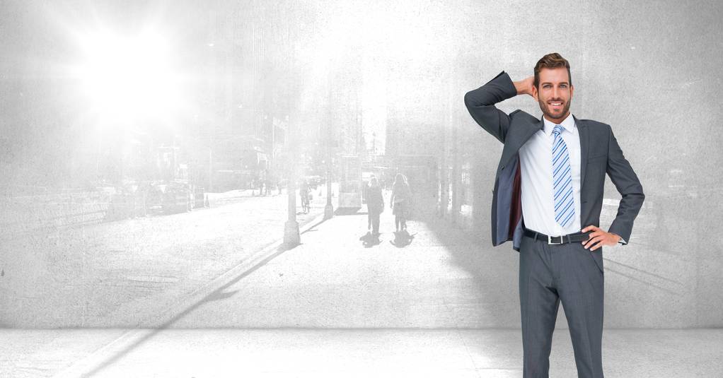 Digital composite of Businessman standing with city wall - Photo, Image