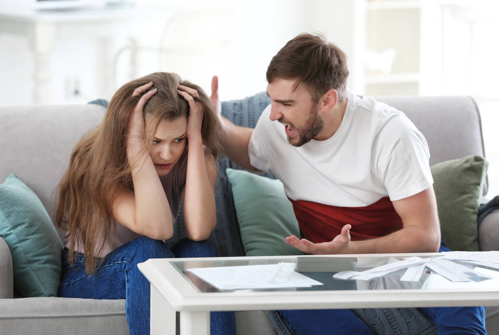 Couple arguing about money at home. Problems in relationship - Photo, Image