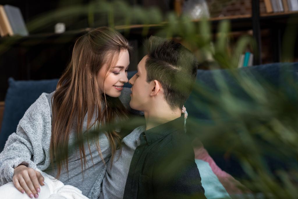 couple going to kiss in bed in morning - Photo, Image