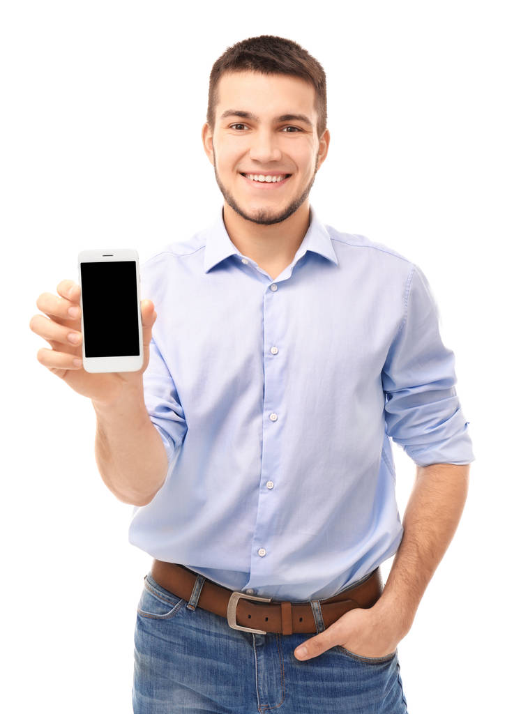 Jeune homme avec téléphone portable sur fond blanc
 - Photo, image
