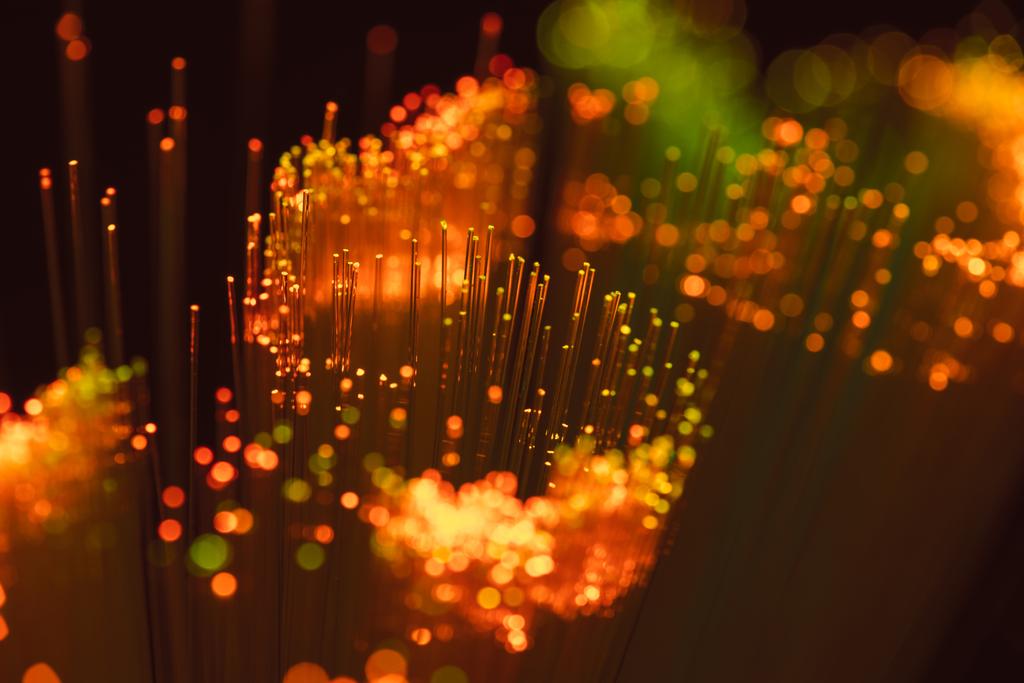 messa a fuoco selettiva di sfondo in fibra ottica arancione lucido
 - Foto, immagini