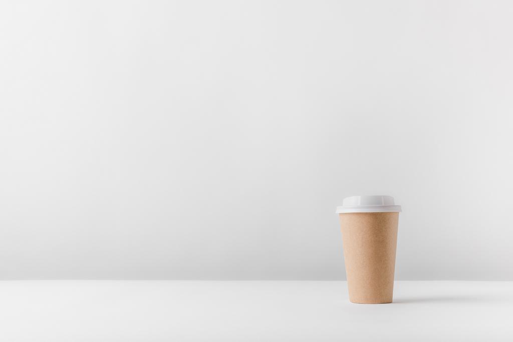 disposable coffee cup on white surface - Photo, Image