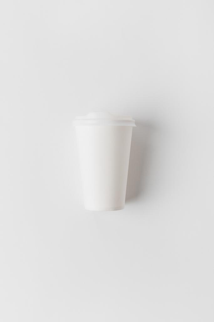 top view of coffee in paper cup on white - Photo, Image