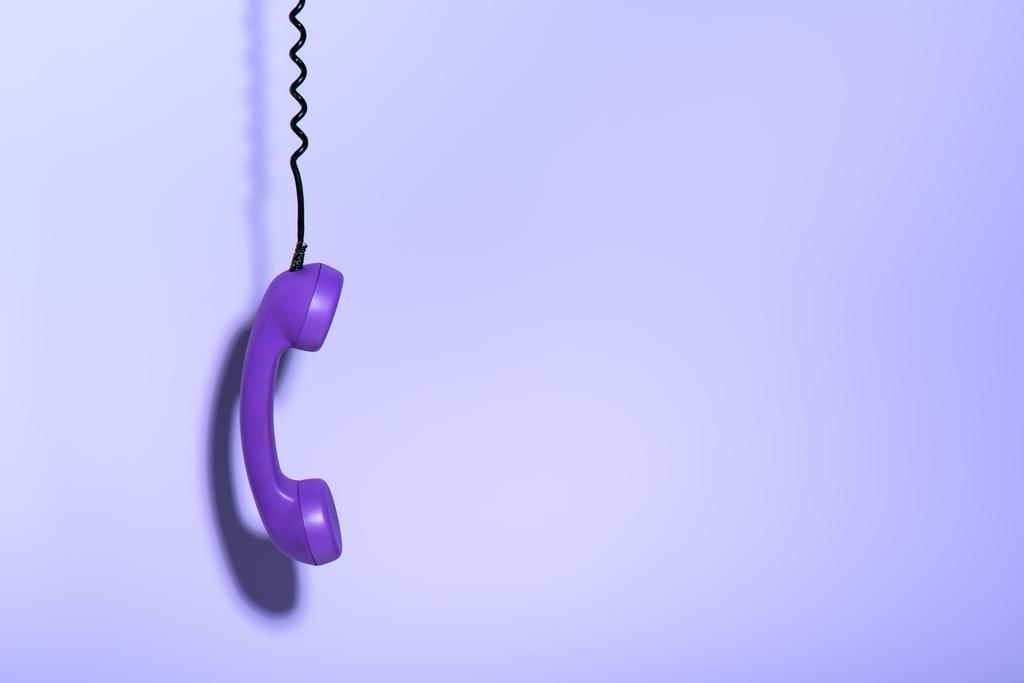 hanging purple phone handset, ultra violet trend - Photo, Image
