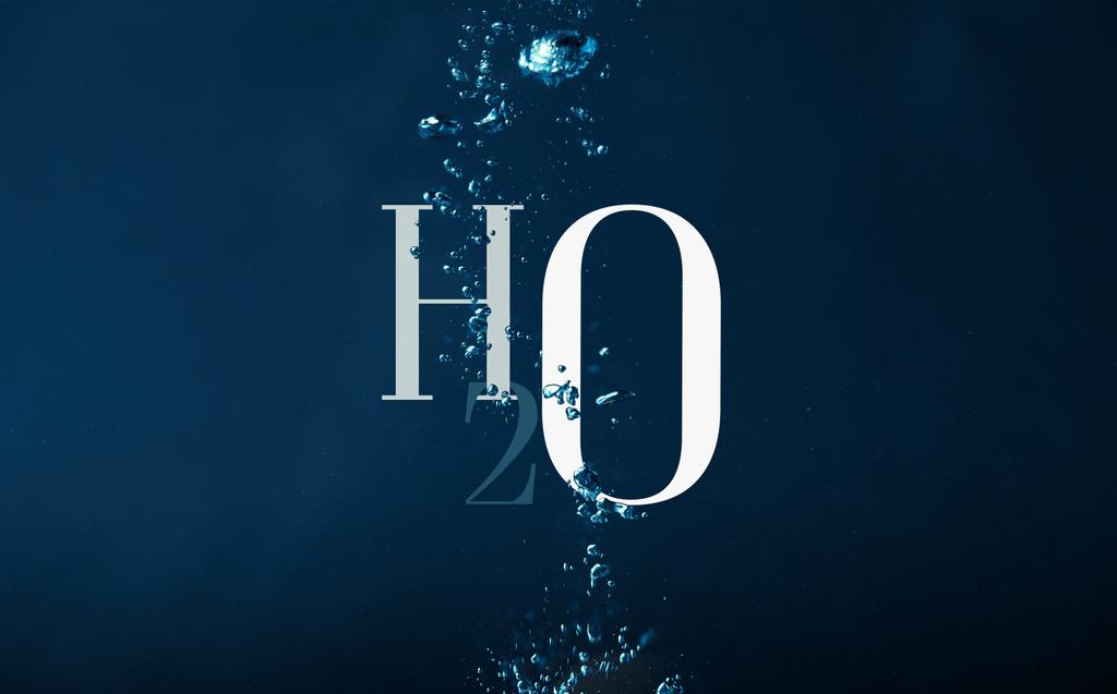 H2O kémia szimbólum és a buborékok háttér víz - Fotó, kép