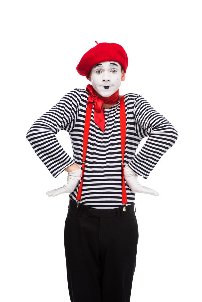 surprised mime standing with hands akimbo isolated on white - Photo, Image