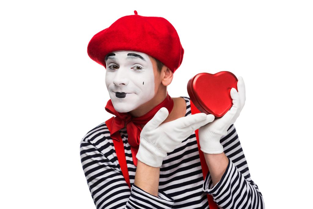 happy mime showing at heart shaped gift box isolated on white, st valentines day concept - Photo, Image
