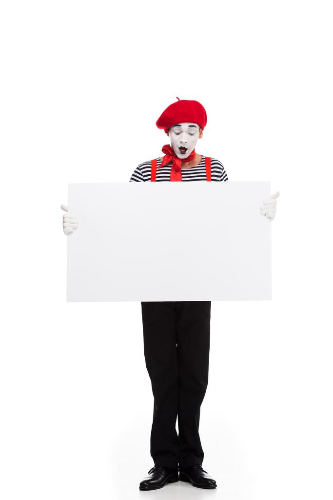 surprised mime looking at empty board isolated on white - Photo, Image