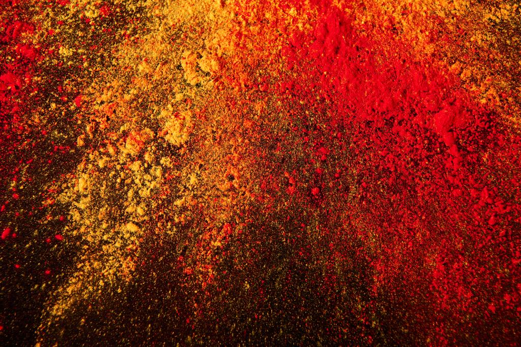 барвистий вибух порошку холі на чорному
 - Фото, зображення