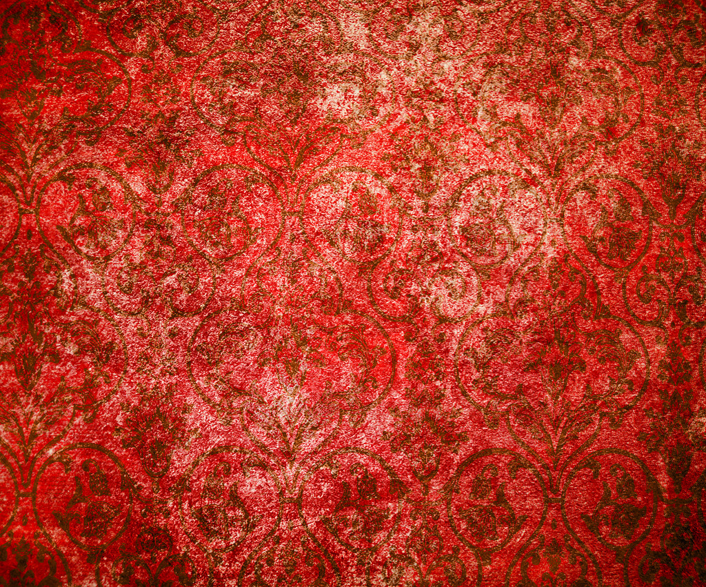 Abstrakti punainen tausta tai paperi, jossa kirkas keskellä valokeila ja tumma reunus grunge tausta rakenne ja ruskea kukka kuvioita
 - Valokuva, kuva