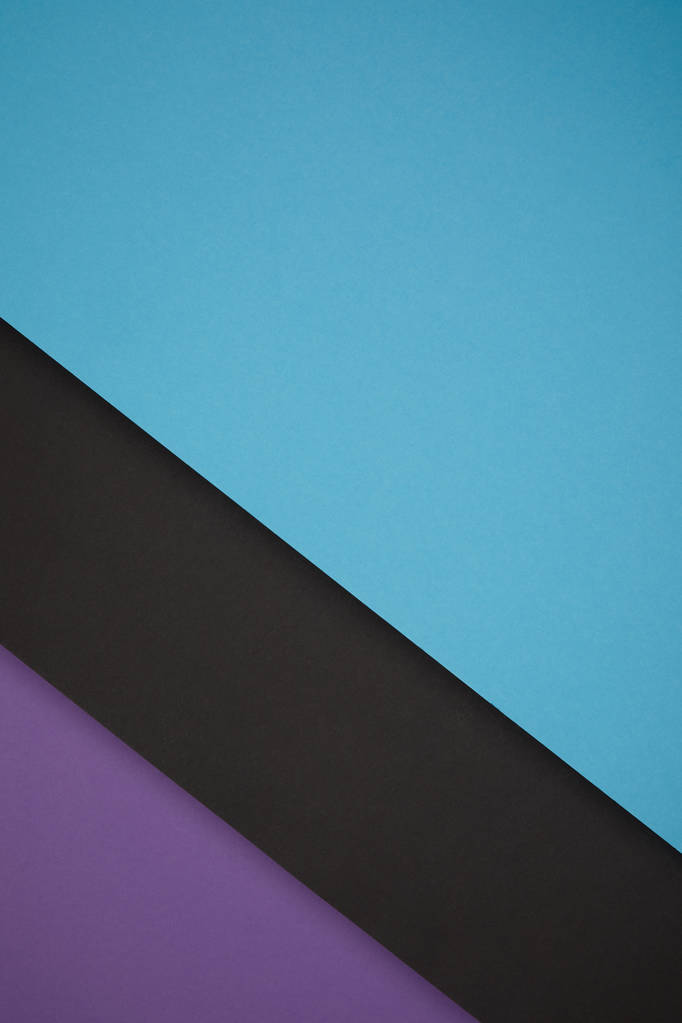 blauer, schwarzer und lila geometrischer Hintergrund aus farbigem Papier - Foto, Bild