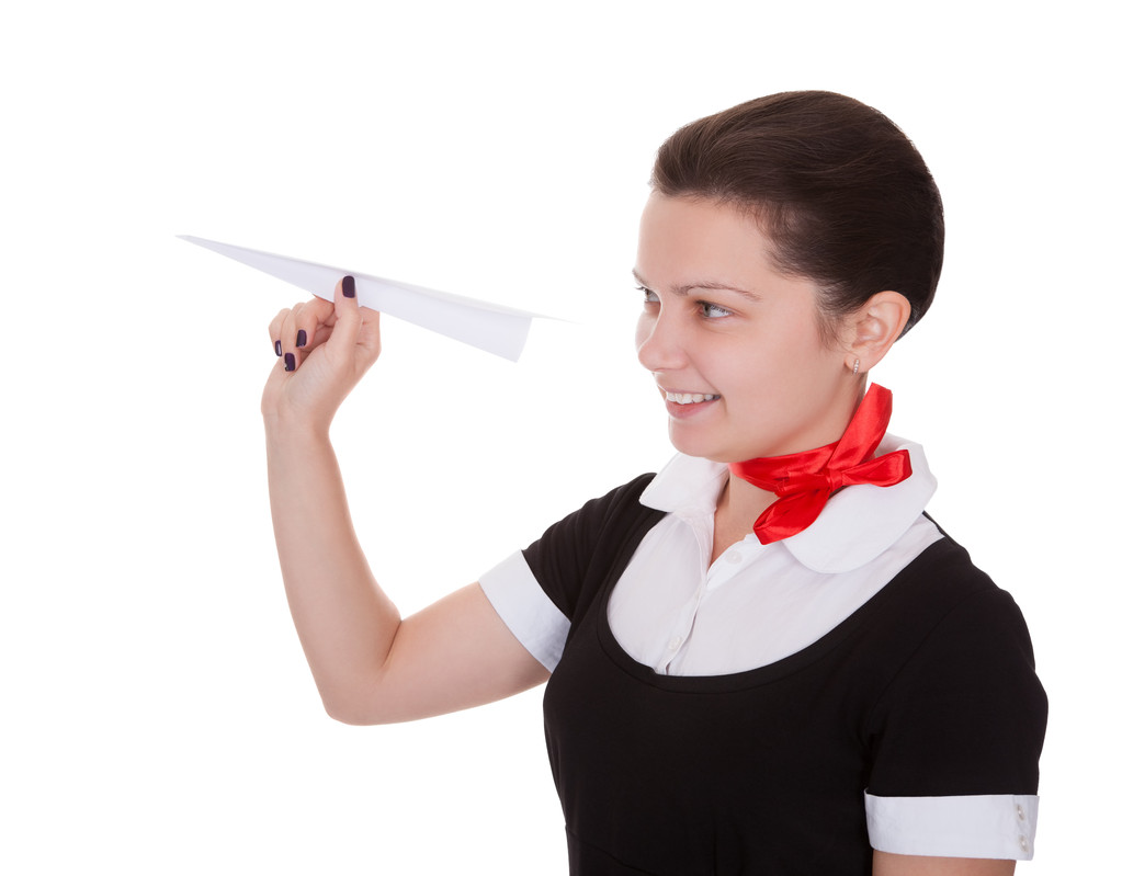 Прекрасная стюардесса с бумажным самолетом
 - Фото, изображение