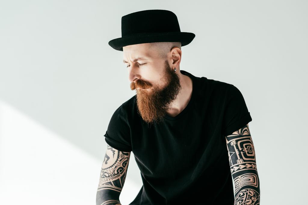 Handsome Bearded Tattooed Man With Closed Eyes Free Stock Photo and Image