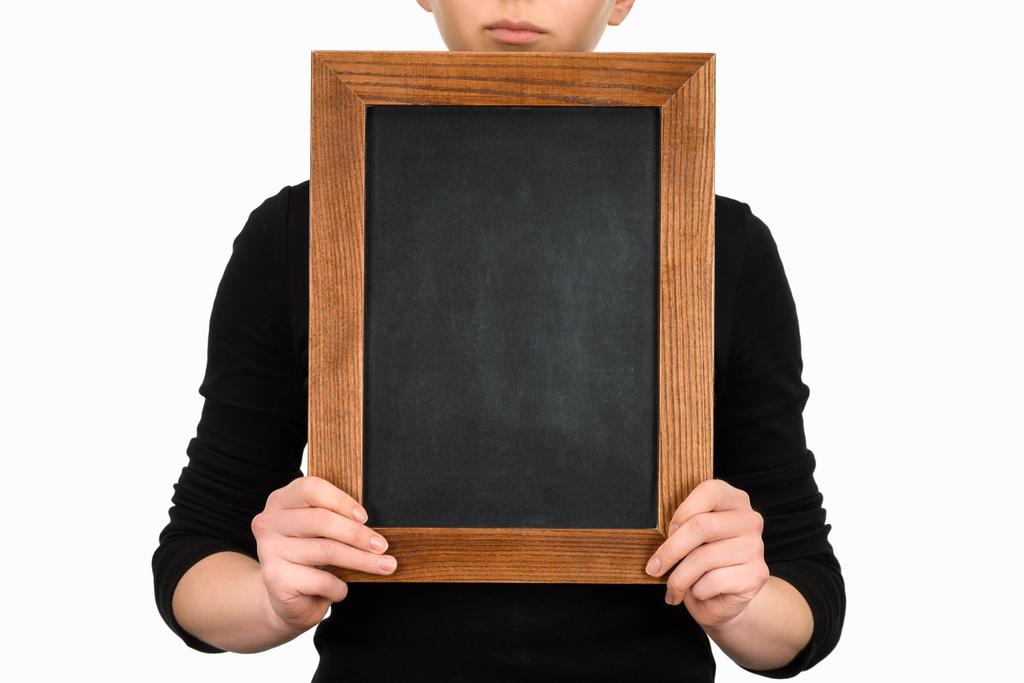 Cropped image of woman holding empty chalkboard isolated on white - Photo, Image