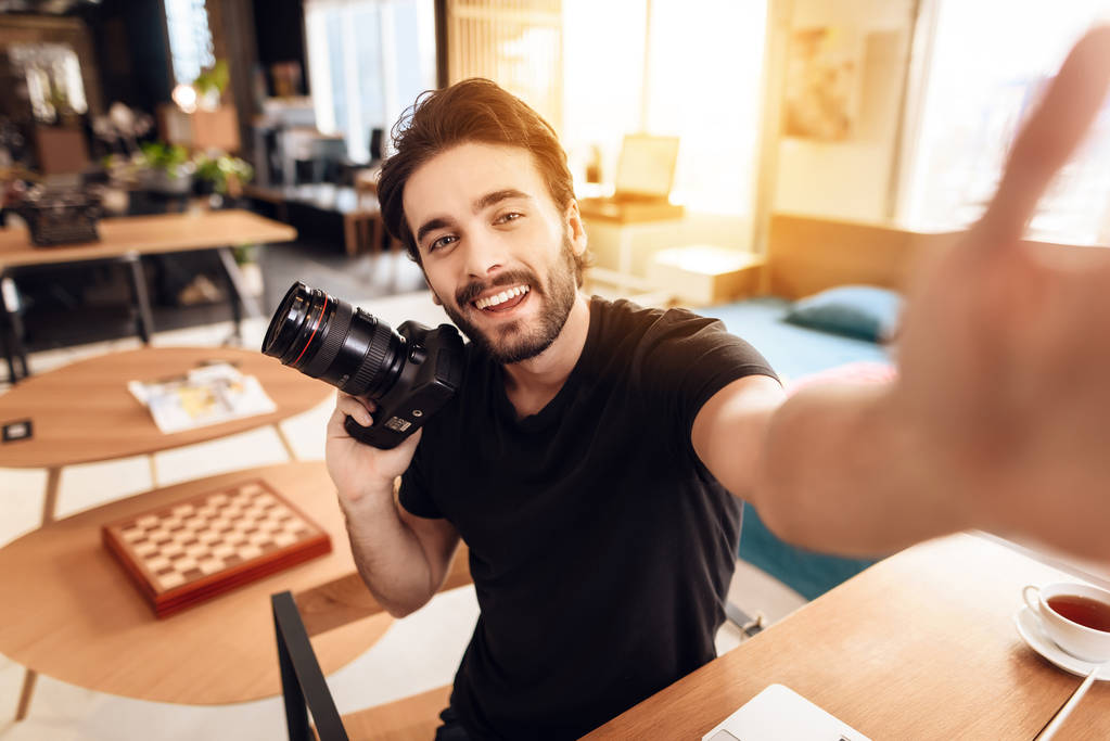 Freelancer bearded man taking selfie at laptop sitting at desk. - Photo, Image