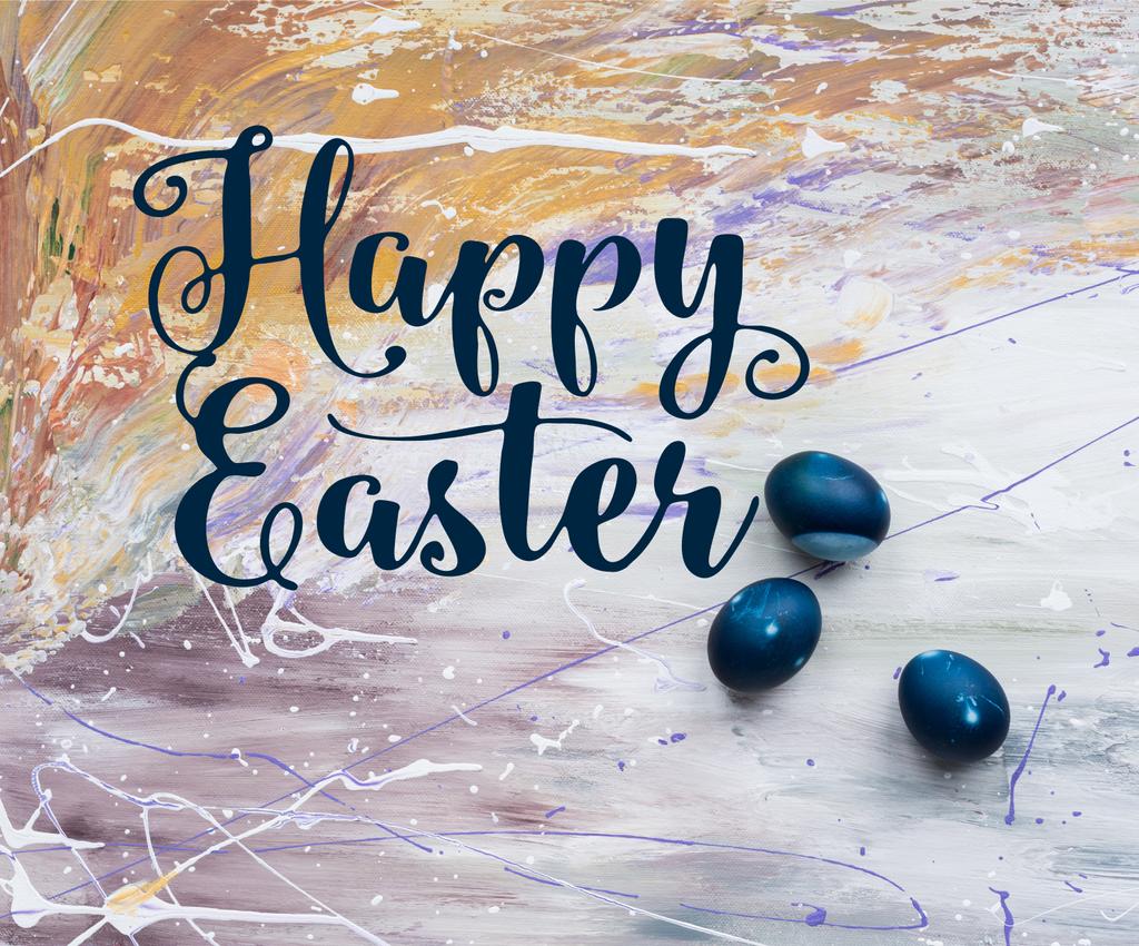 Painted Easter eggs with happy easter lettering on stained background - Photo, Image