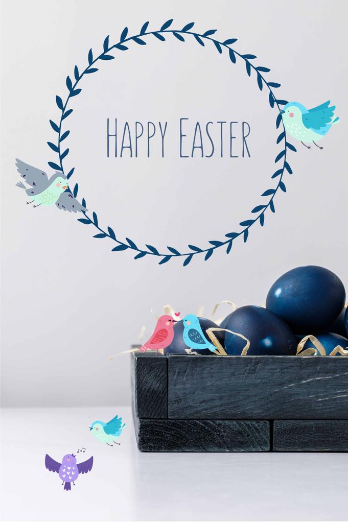 ovos de Páscoa pintados de azul em caixa com pássaros desenhados e letras de Páscoa felizes
 - Foto, Imagem