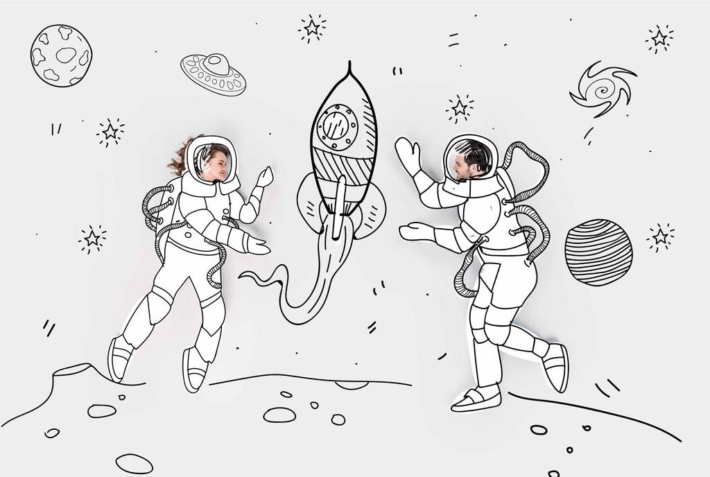 collage dibujado a mano creativo con pareja en trajes espaciales y cohete
 - Foto, Imagen