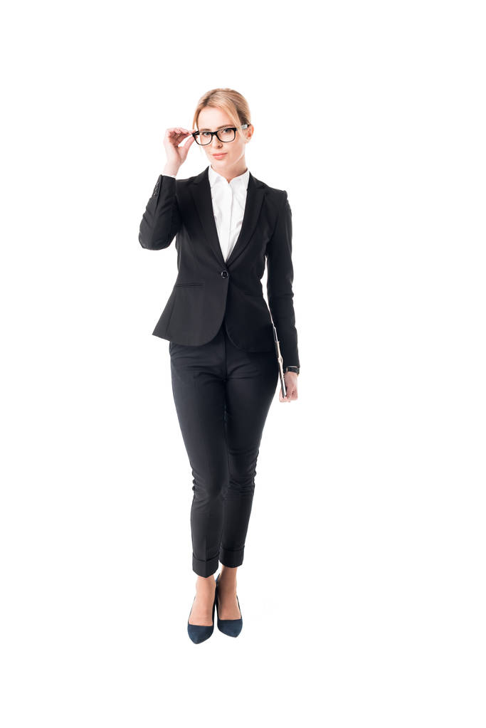 Giovane donna d'affari indossa tuta e occhiali isolati su bianco
 - Foto, immagini