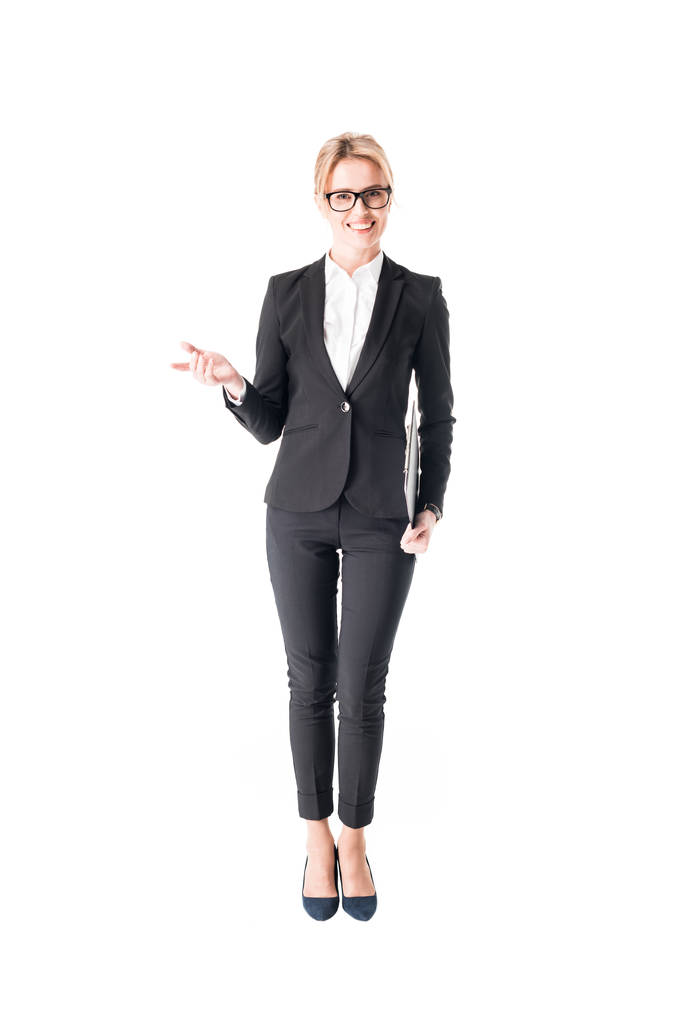 Smiling businesswoman looking at camera isolated on white - Photo, Image