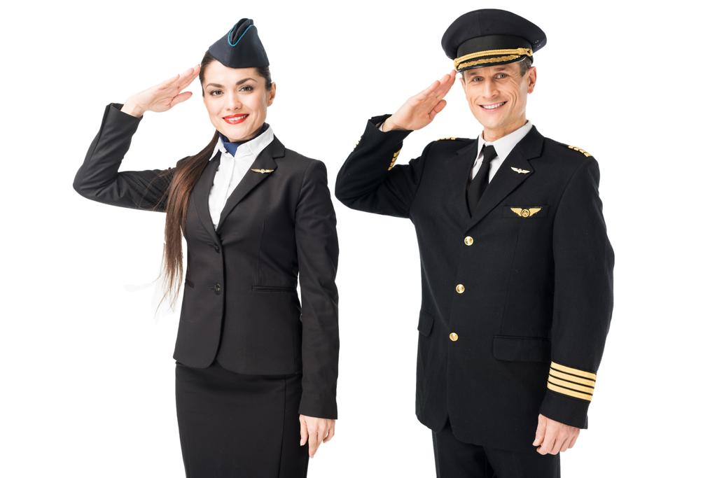 Havayolu Kaptan ve izole üzerinde beyaz selamlayan hostes - Fotoğraf, Görsel