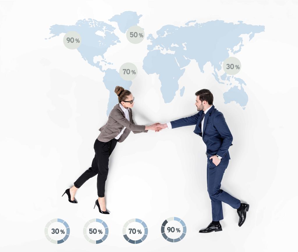 creative collage of business partners shaking hands against world statistics map - Photo, Image