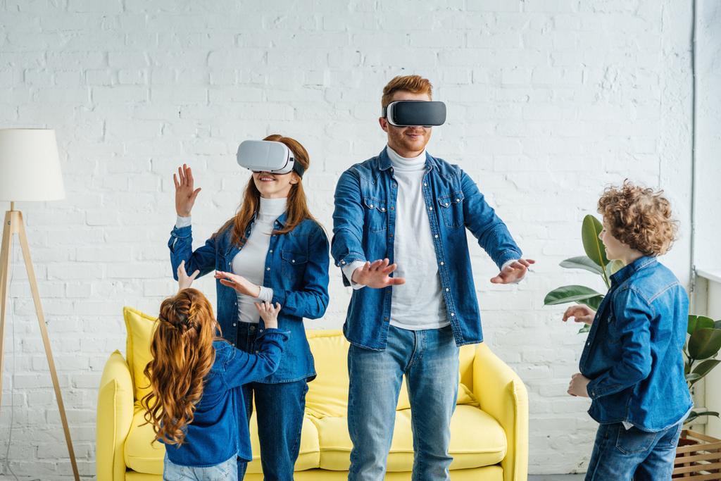 Kids playing with parents wearing vr glasses - Photo, Image