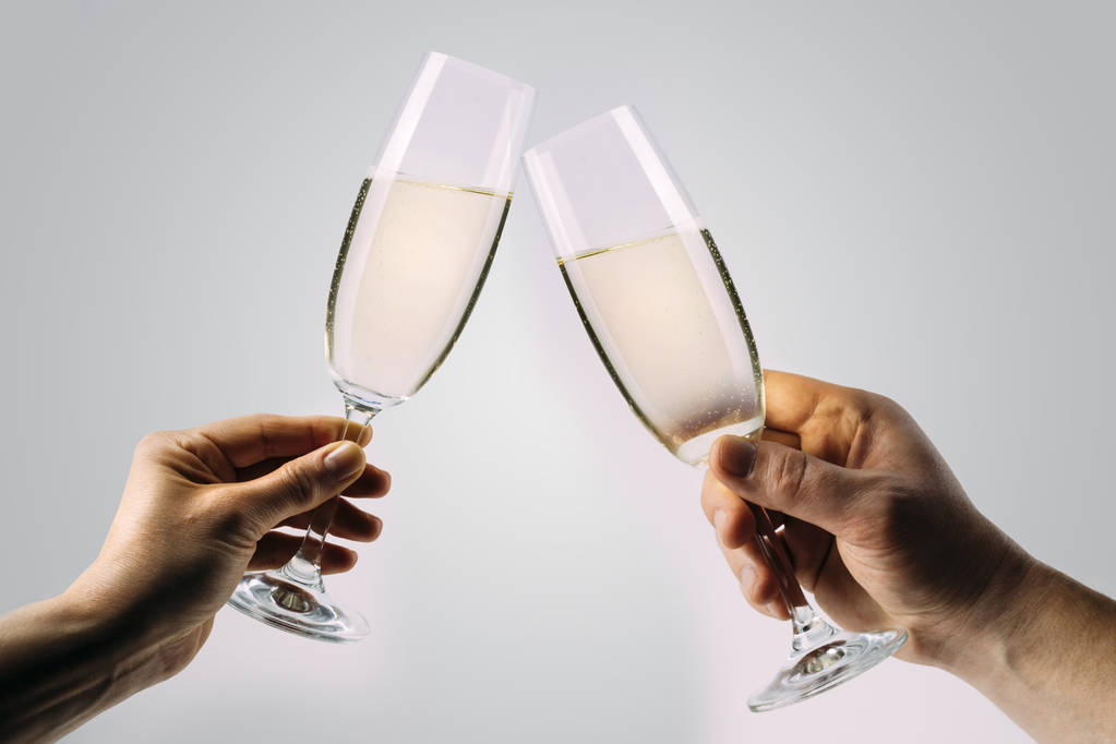 Two hands holding and toasting champagne - Photo, Image