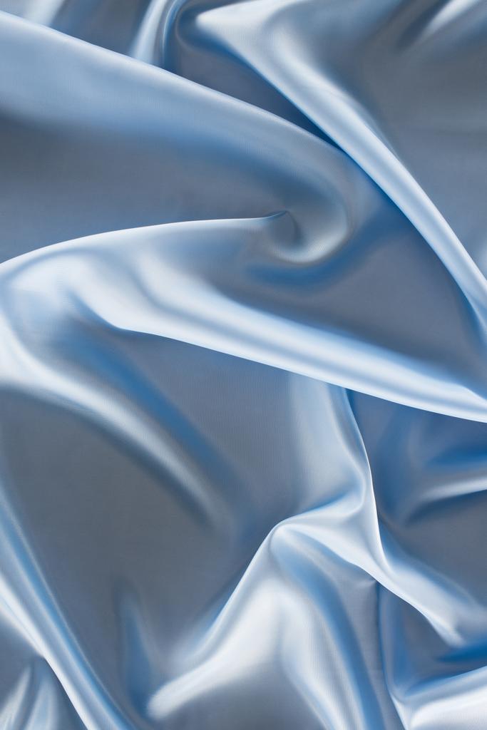 синій блискучий атласний тканинний фон
 - Фото, зображення