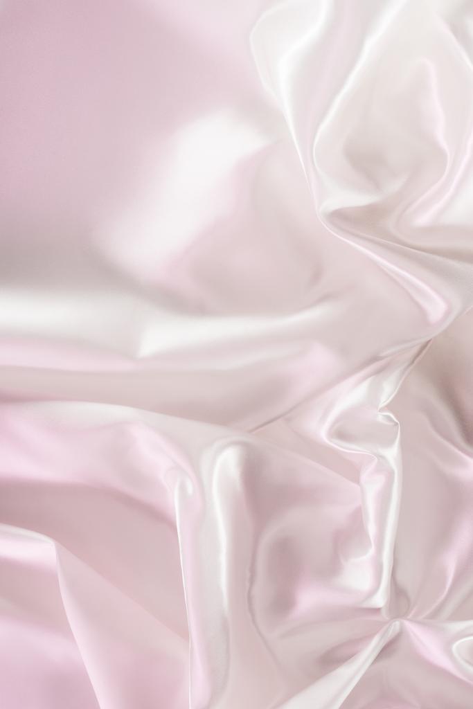 tło światło różowy zmięty błyszczące tkaniny jedwabne - Zdjęcie, obraz