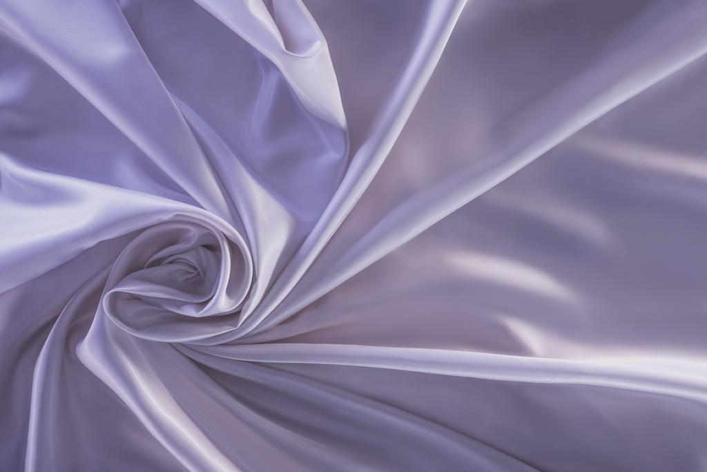 crumpled violet shiny silk fabric background - Photo, Image