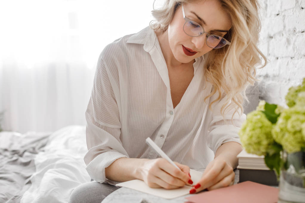 Woman Writing at Home - Photo, Image