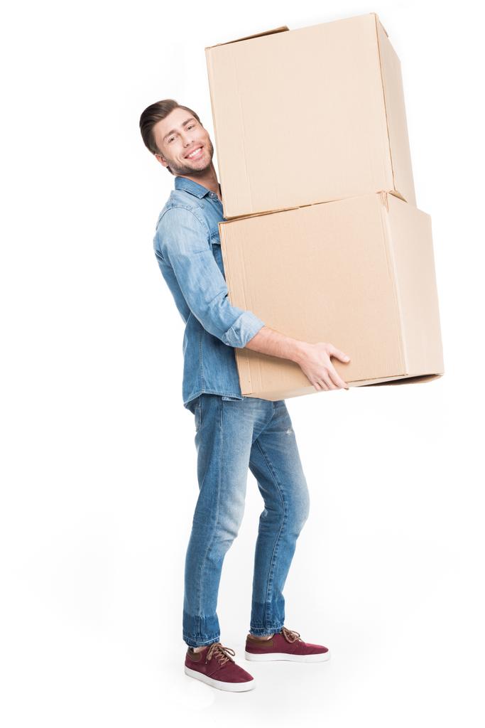 Mann zieht mit Kartons um, isoliert auf weiß - Foto, Bild