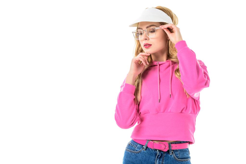 Chica joven con sudadera rosa y gafas aisladas en blanco
 - Foto, imagen