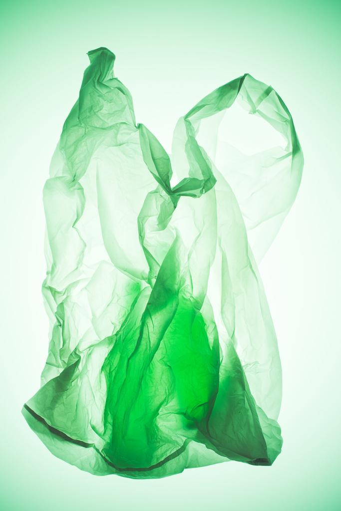 sacchetto di plastica trasparente con sagome di bottiglie sotto la luce colorata tonica
 - Foto, immagini