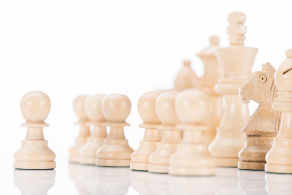 white wooden chess figures on white  - Photo, Image