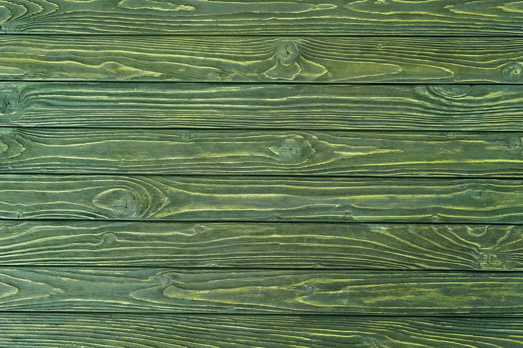 Dřevěné horizontální lamely v zeleném pozadí - Fotografie, Obrázek