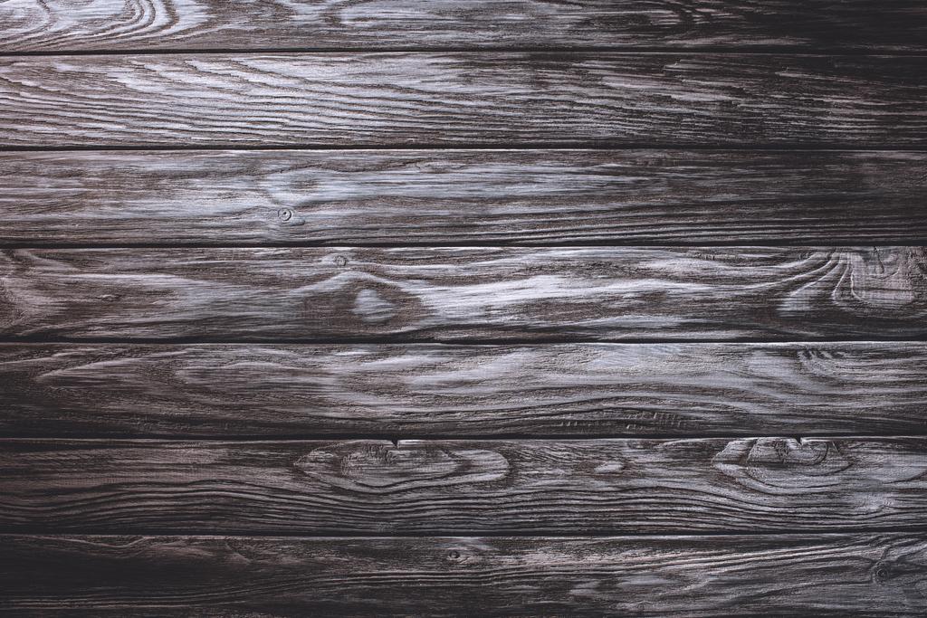 Tablones de madera pintados en fondo gris
 - Foto, imagen