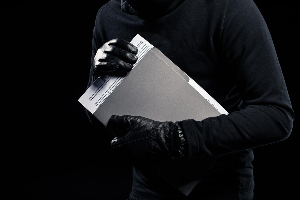 Hırsız elinde kendine güvenen belgelerin görünümünü yakın çekim - Fotoğraf, Görsel