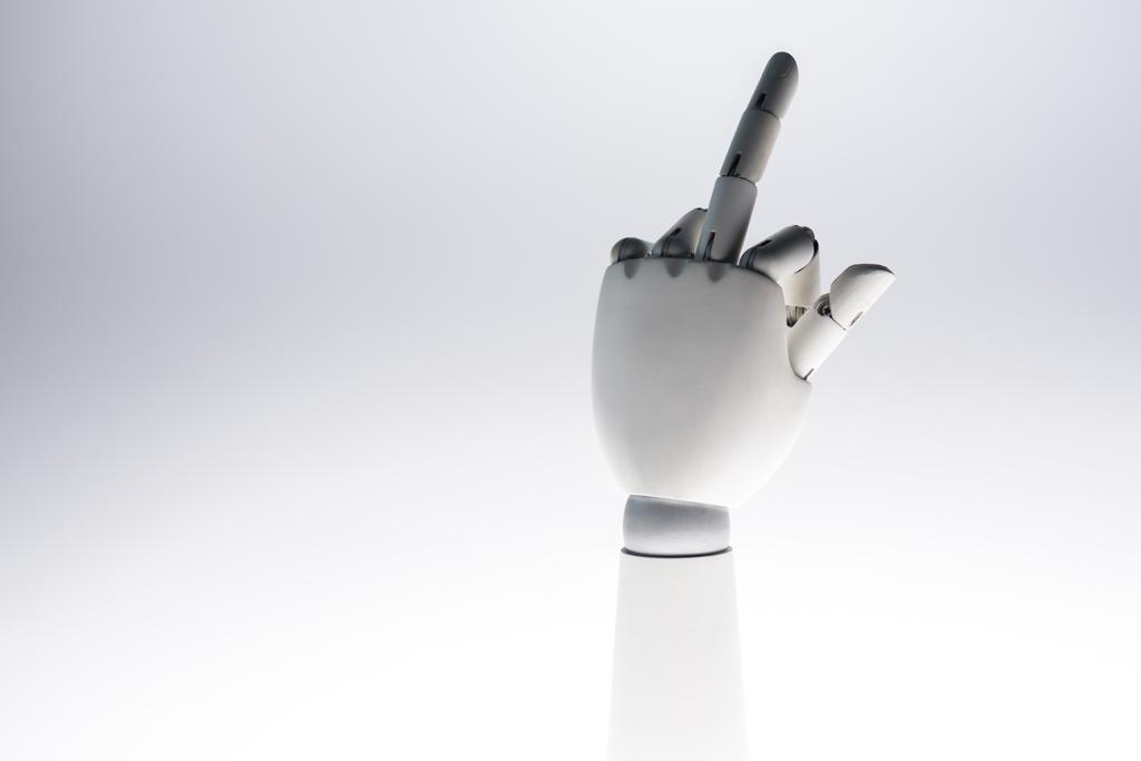 ρομπότ χέρι δείχνει μεσαίο δάχτυλο απομονώνονται σε γκρι - Φωτογραφία, εικόνα
