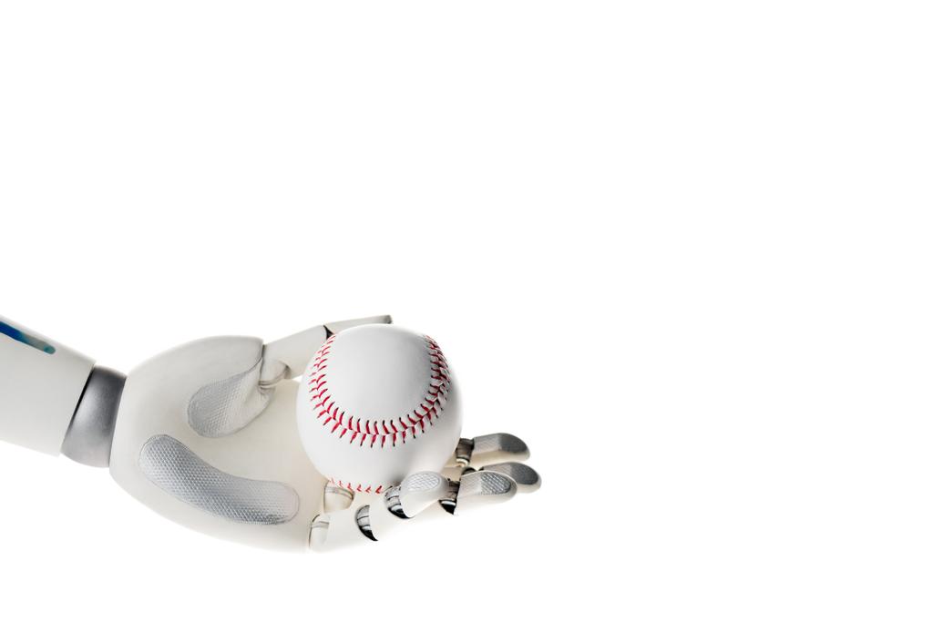 Рука робота тримає білий бейсбольний м'яч ізольований на білому
 - Фото, зображення