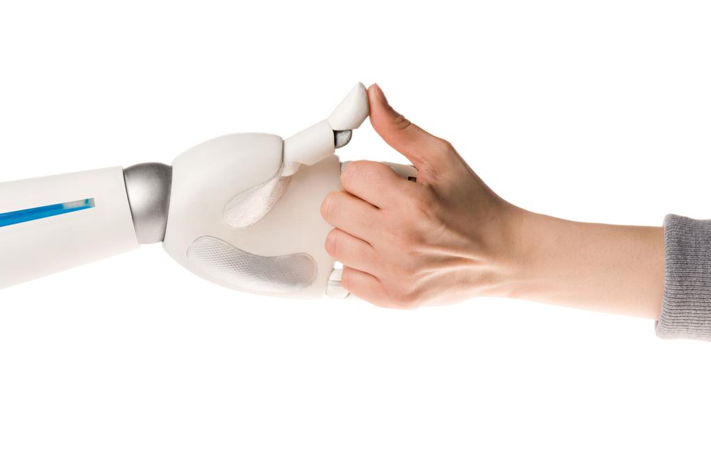 imagen recortada de robot y mujer jugando a las guerras de pulgares aislados en blanco
 - Foto, imagen