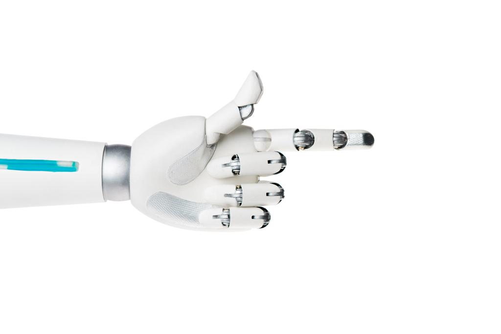 Robot ręka wskazuje na coś na białym tle - Zdjęcie, obraz