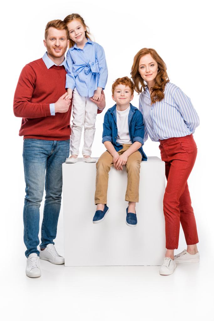 full length view of happy red haired family smiling at camera isolated on white    - Photo, Image