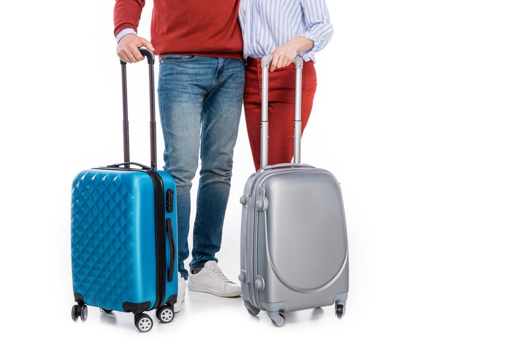 rajattu laukaus pari matkalaukut seisoo yhdessä eristetty valkoinen
 - Valokuva, kuva