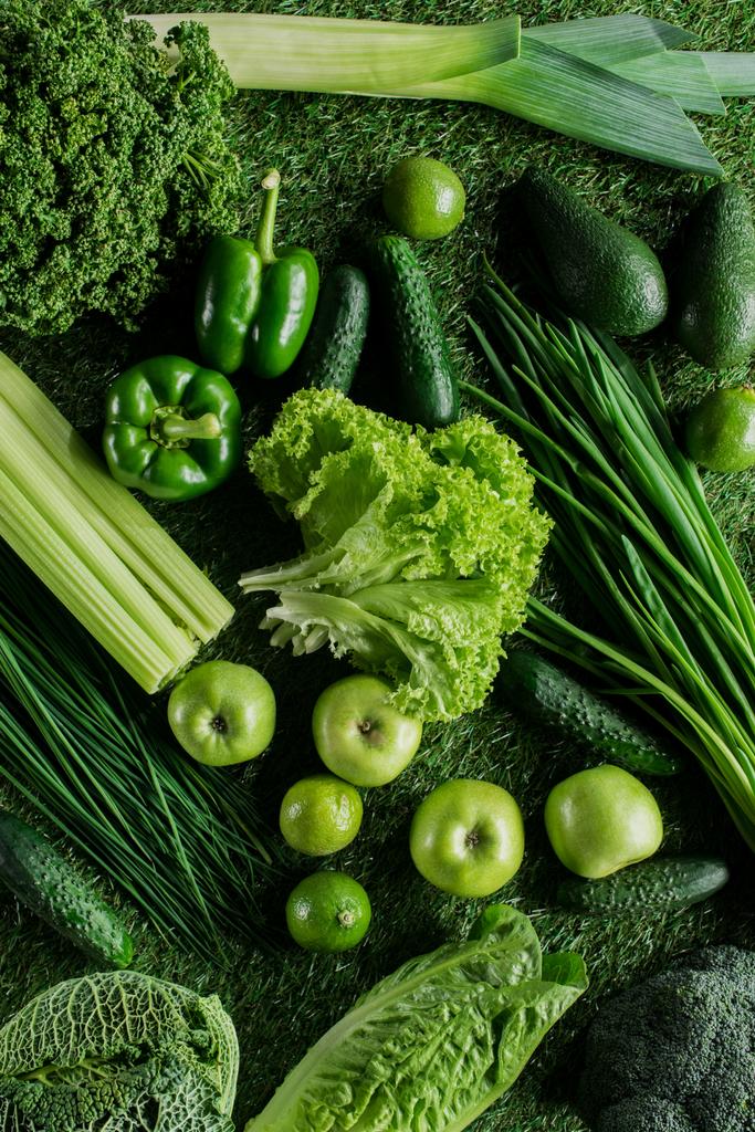 top view of ripe appetizing green vegetables on grass, healthy eating concept - Photo, Image
