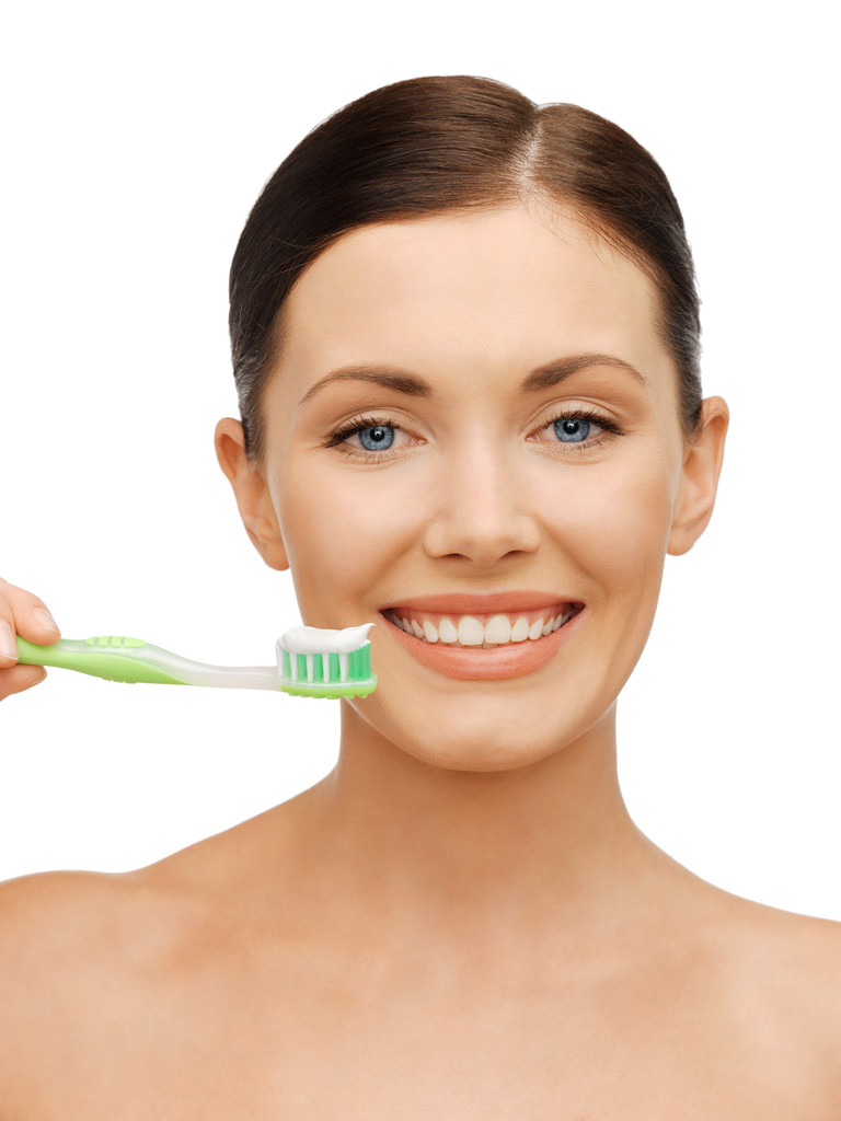 Mujer con cepillo de dientes
 - Foto, imagen