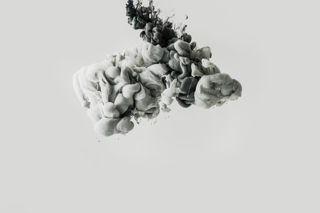 close up view of mixing gray smoke isolated on gray - Photo, Image