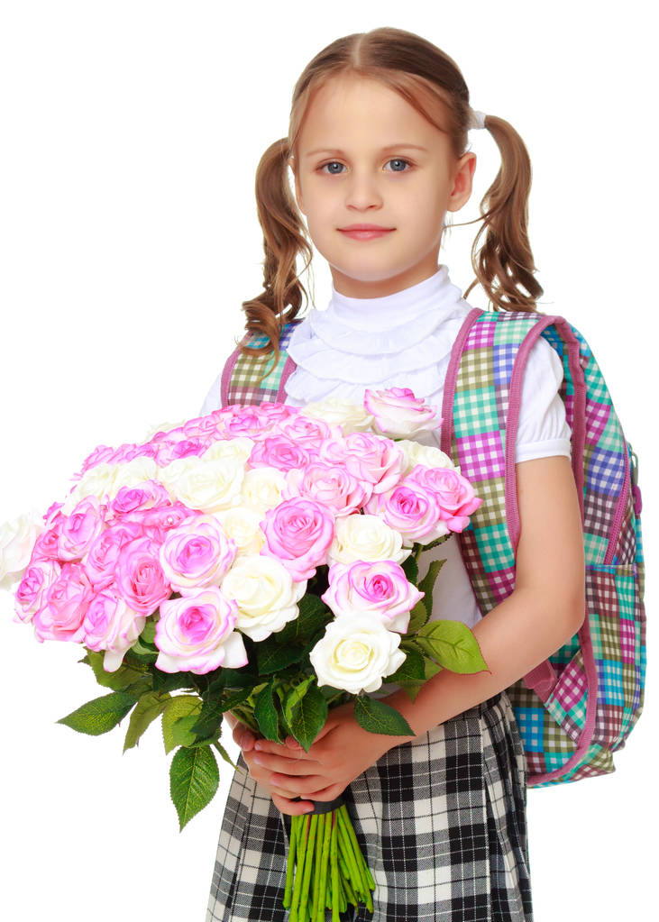 Petite fille écolière avec des fleurs
 - Photo, image